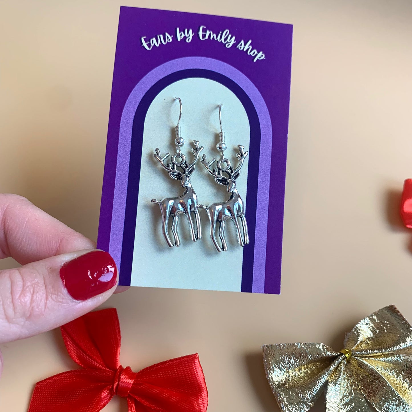 Festive silver reindeer Christmas earrings