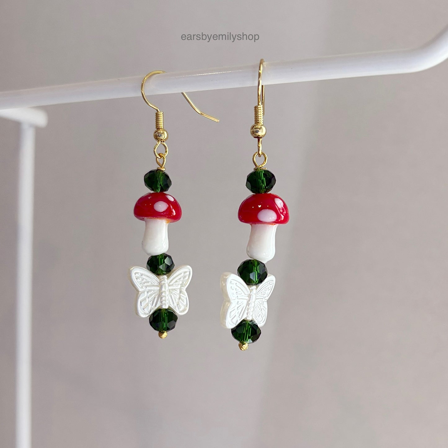 Gold plated mushroom and butterfly dangle earrings