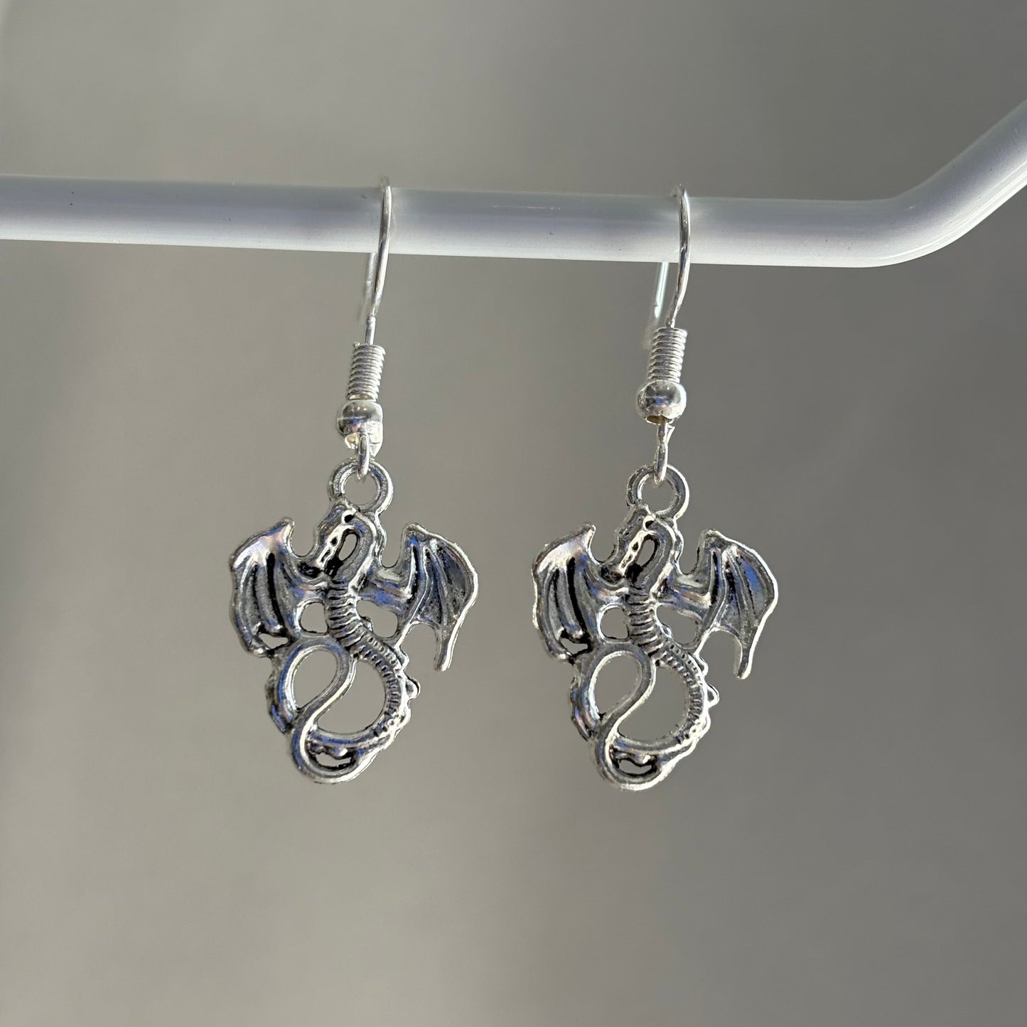 Silver little dragon dangle earrings