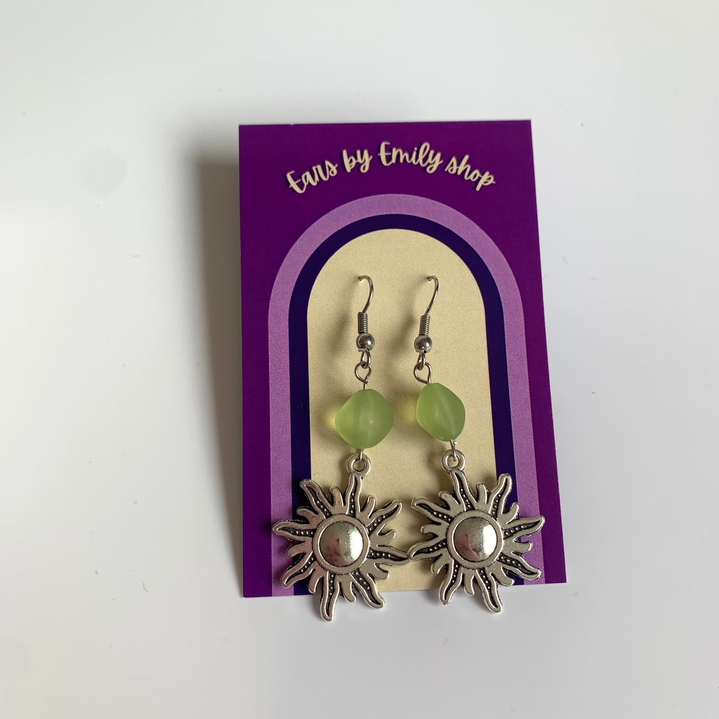 Cool silver sun with green bead statement dangle hypoallergenic earrings