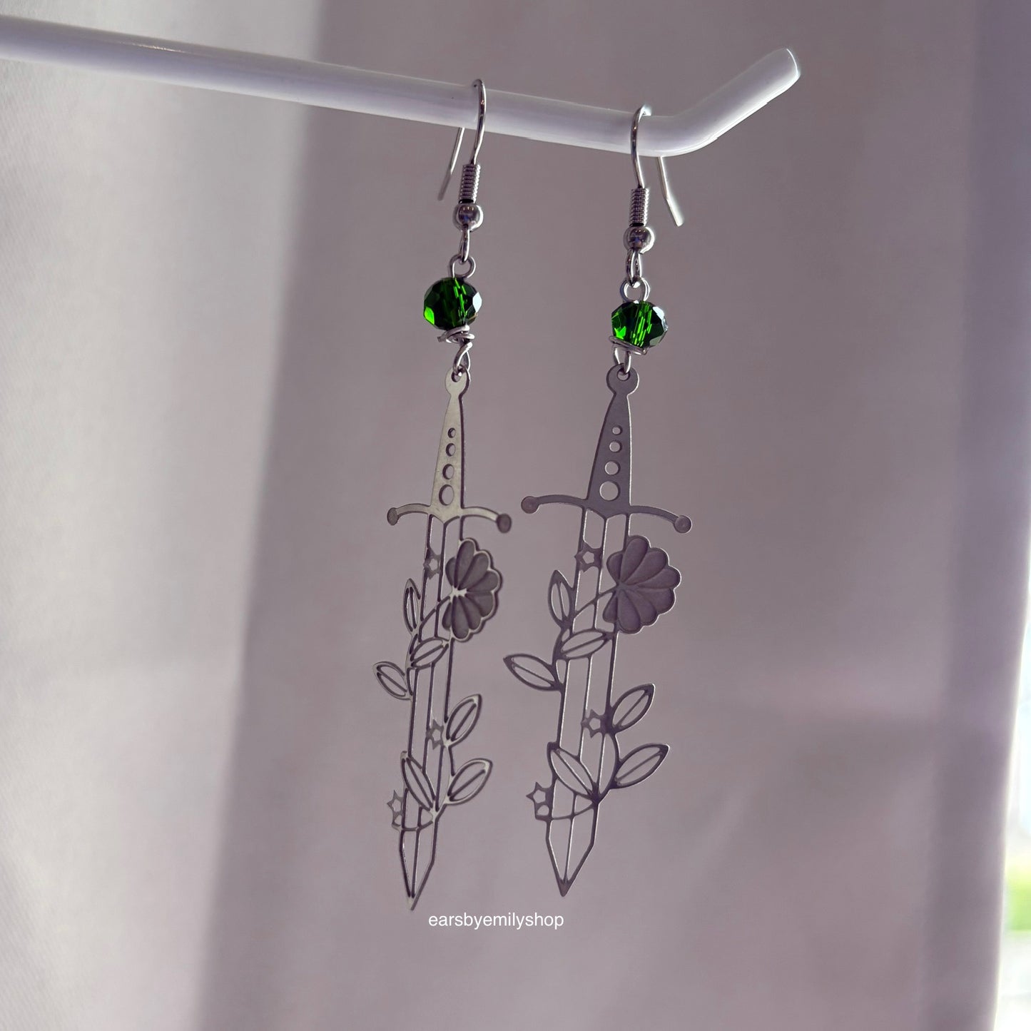 Silver stainless steel floral sword earrings with pink or green beads