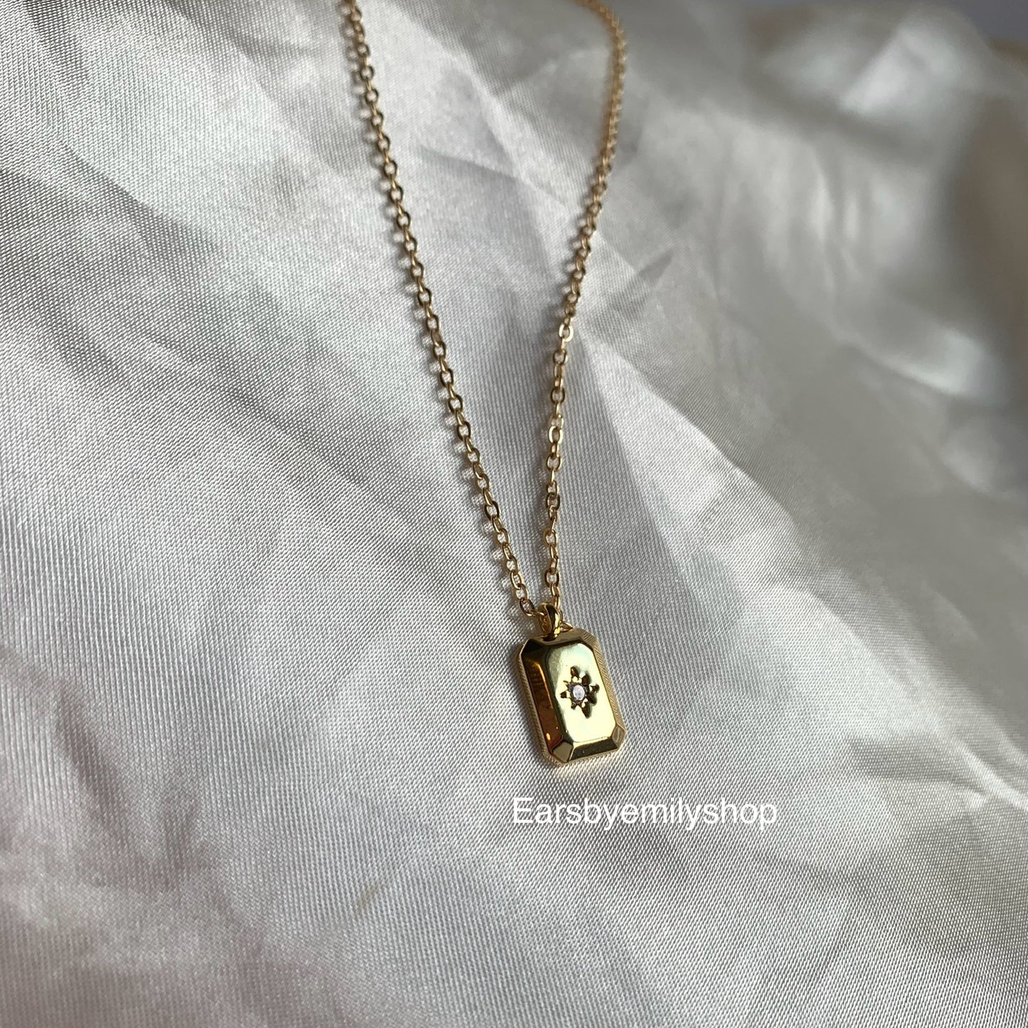 Gold plated rectangle pendant with white crystal diamanté necklace