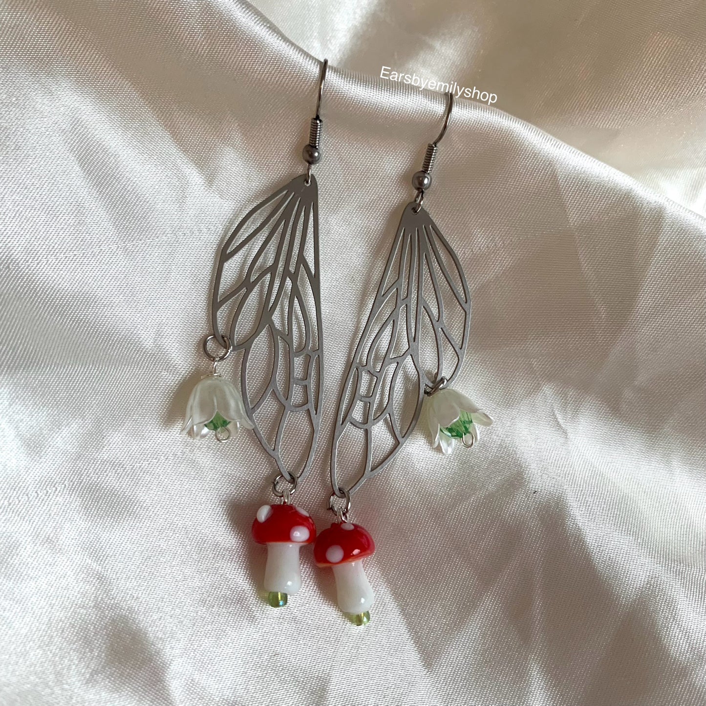 Silver stainless steel butterfly fairy wing earrings with mushrooms and flowers