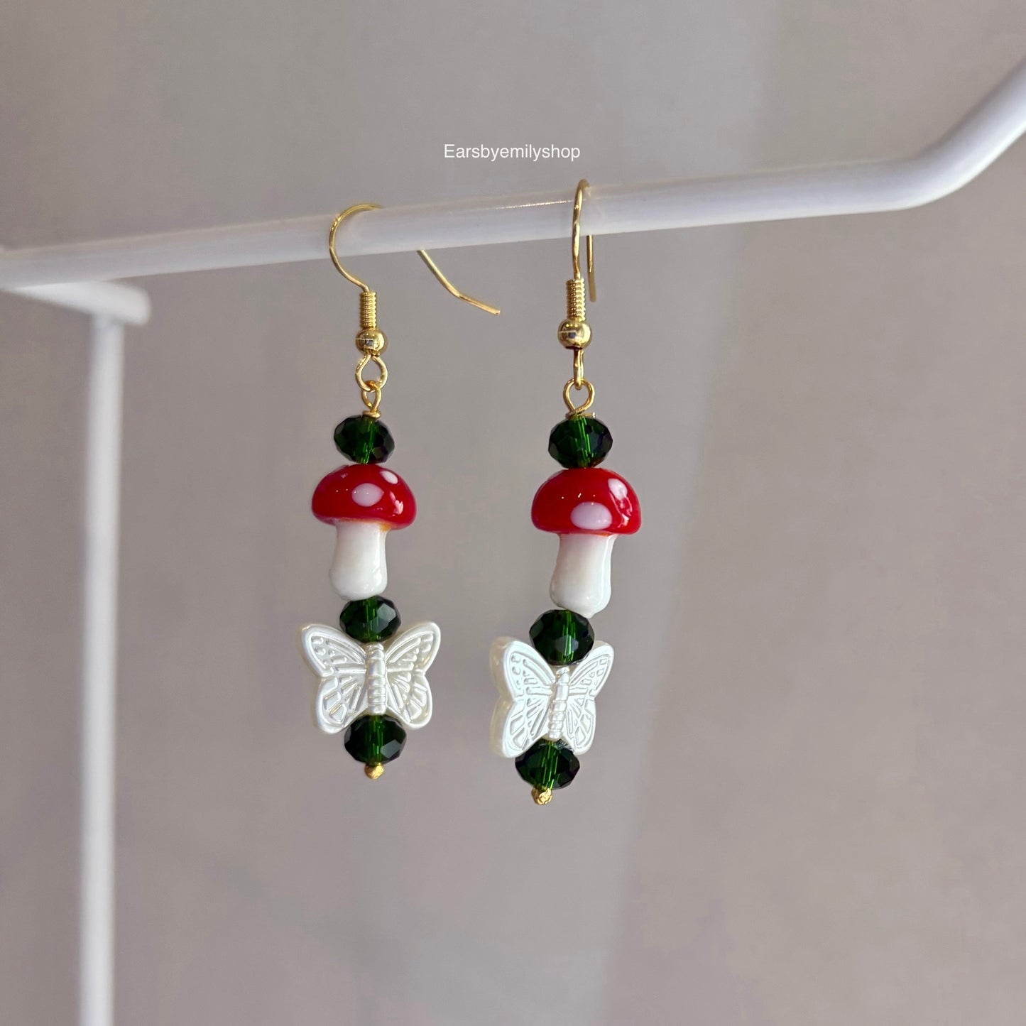 Gold plated mushroom and butterfly dangle earrings