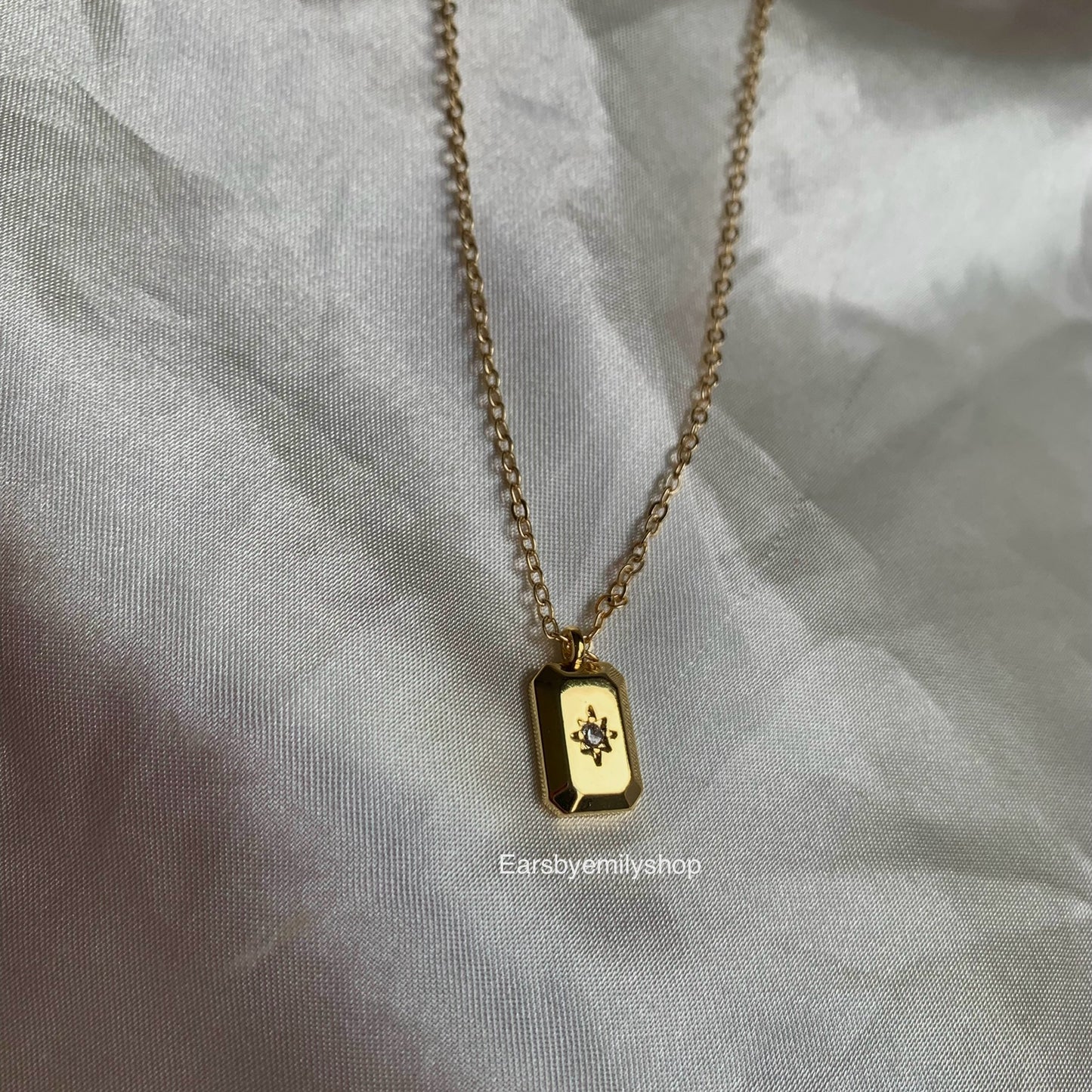 Gold plated rectangle pendant with white crystal diamanté necklace