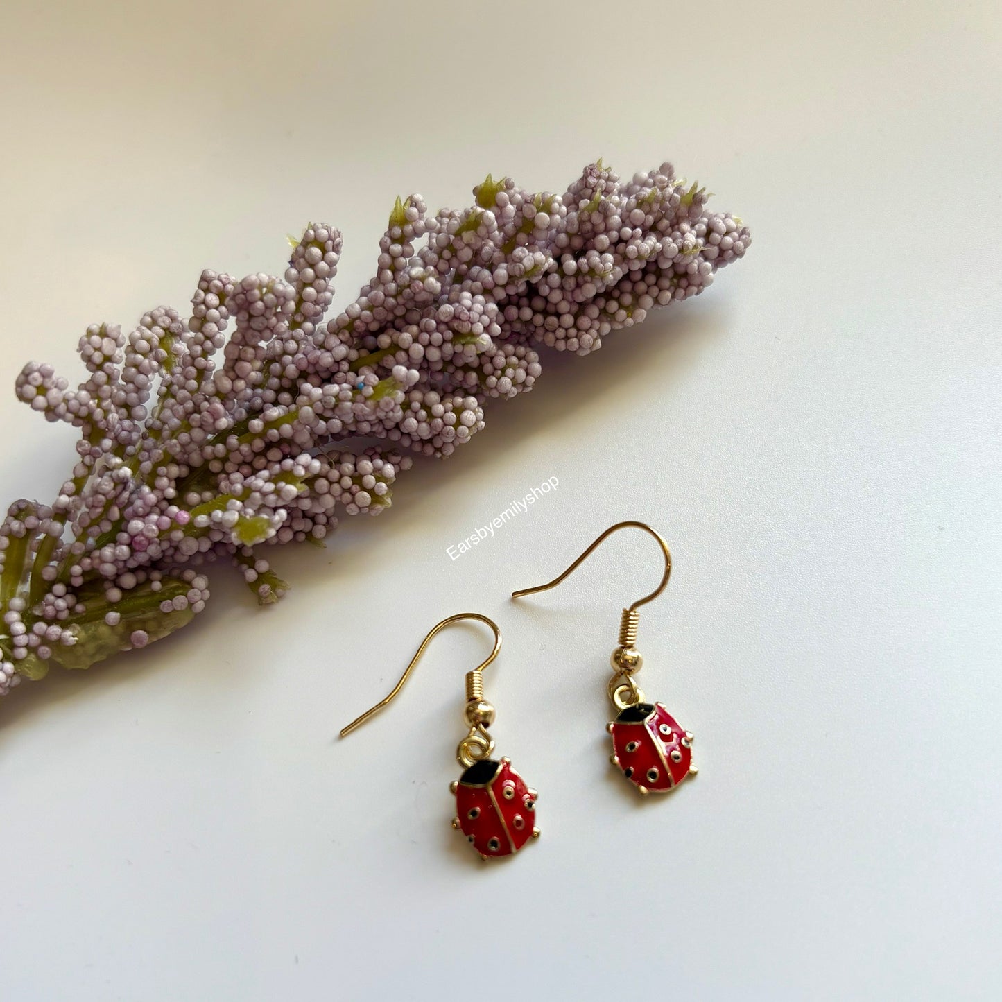 Cool red and black tiny ladybird insect dangle earrings on 18k gold plated hooks