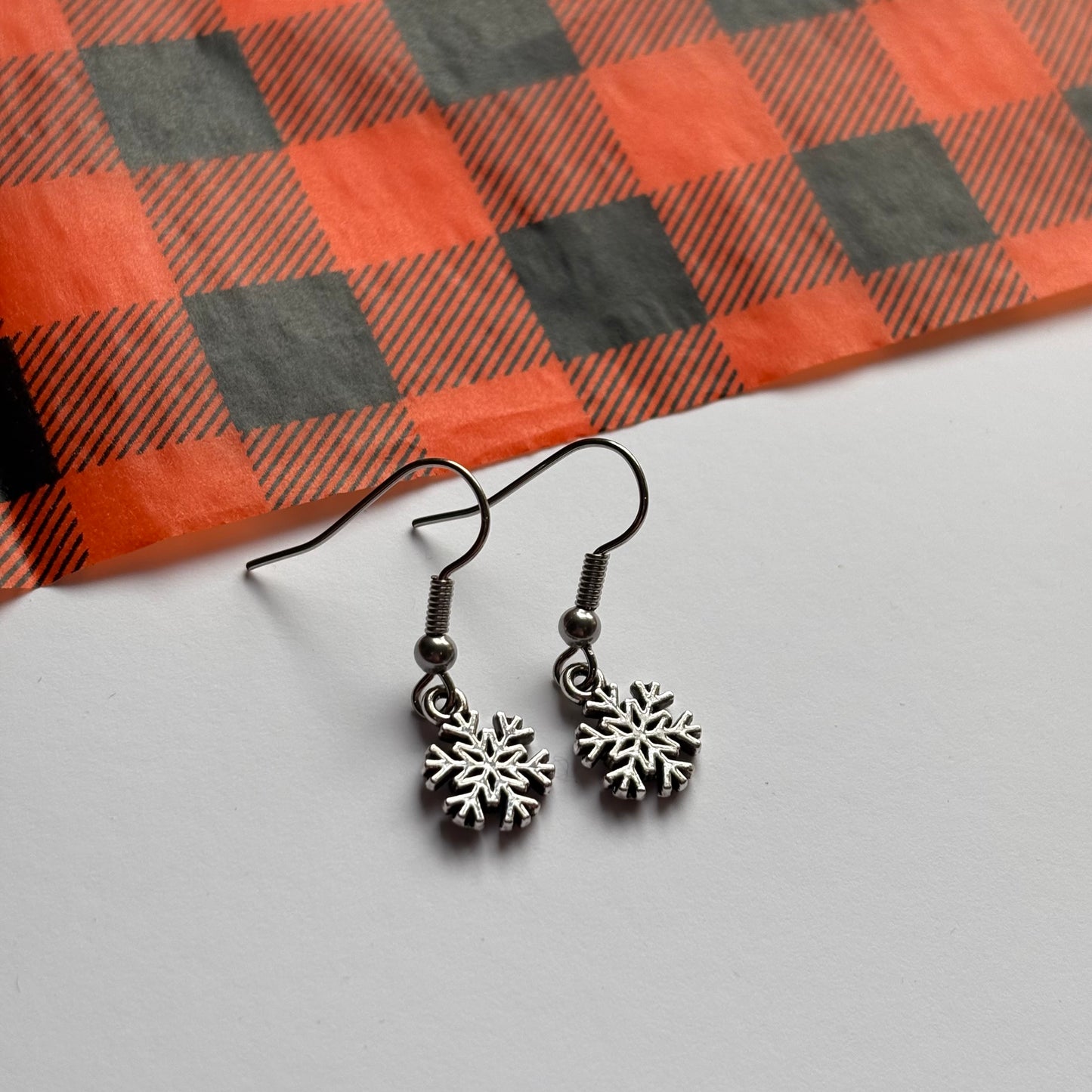 Silver minimalist Christmas snowflake dangle earrings