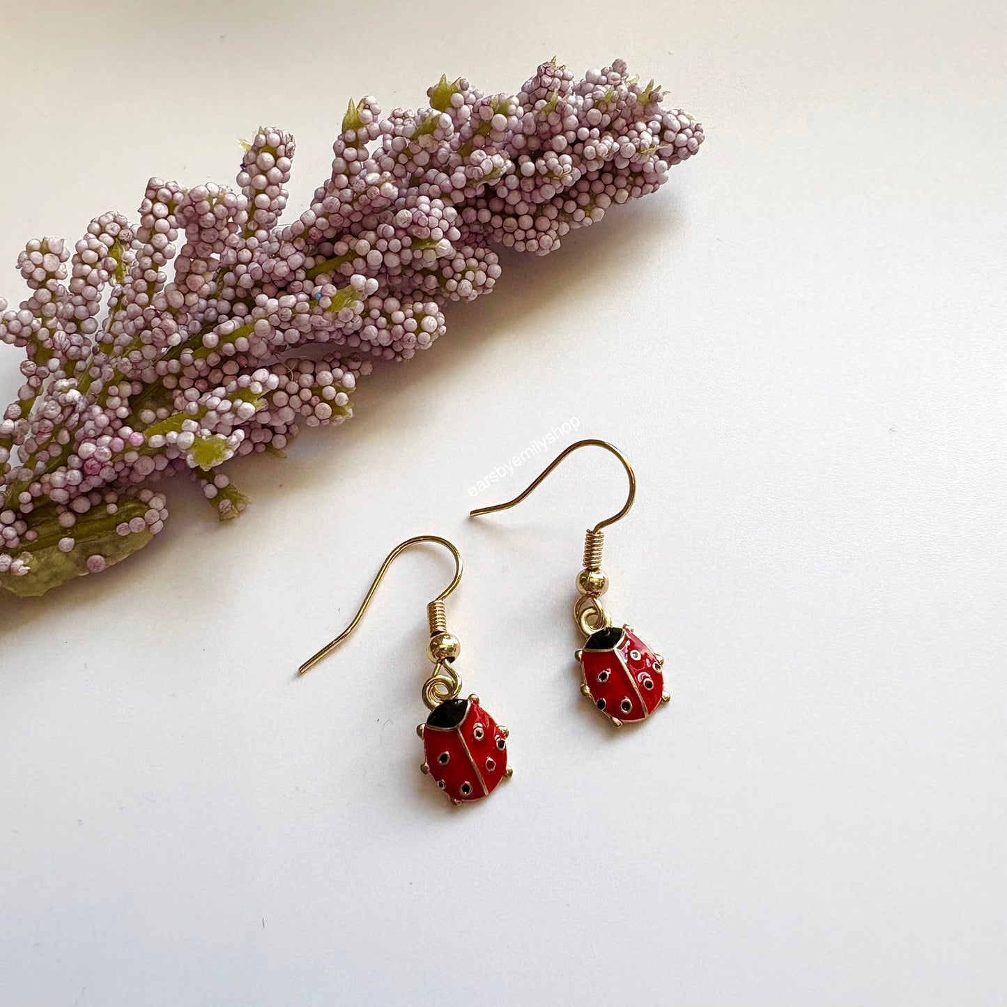 Cool red and black tiny ladybird insect dangle earrings on 18k gold plated hooks