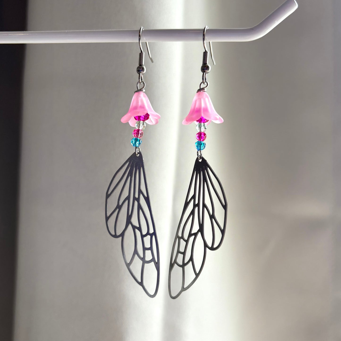 Stainless steel silver fairy wing dangle earrings with pink flowers and colourful beads