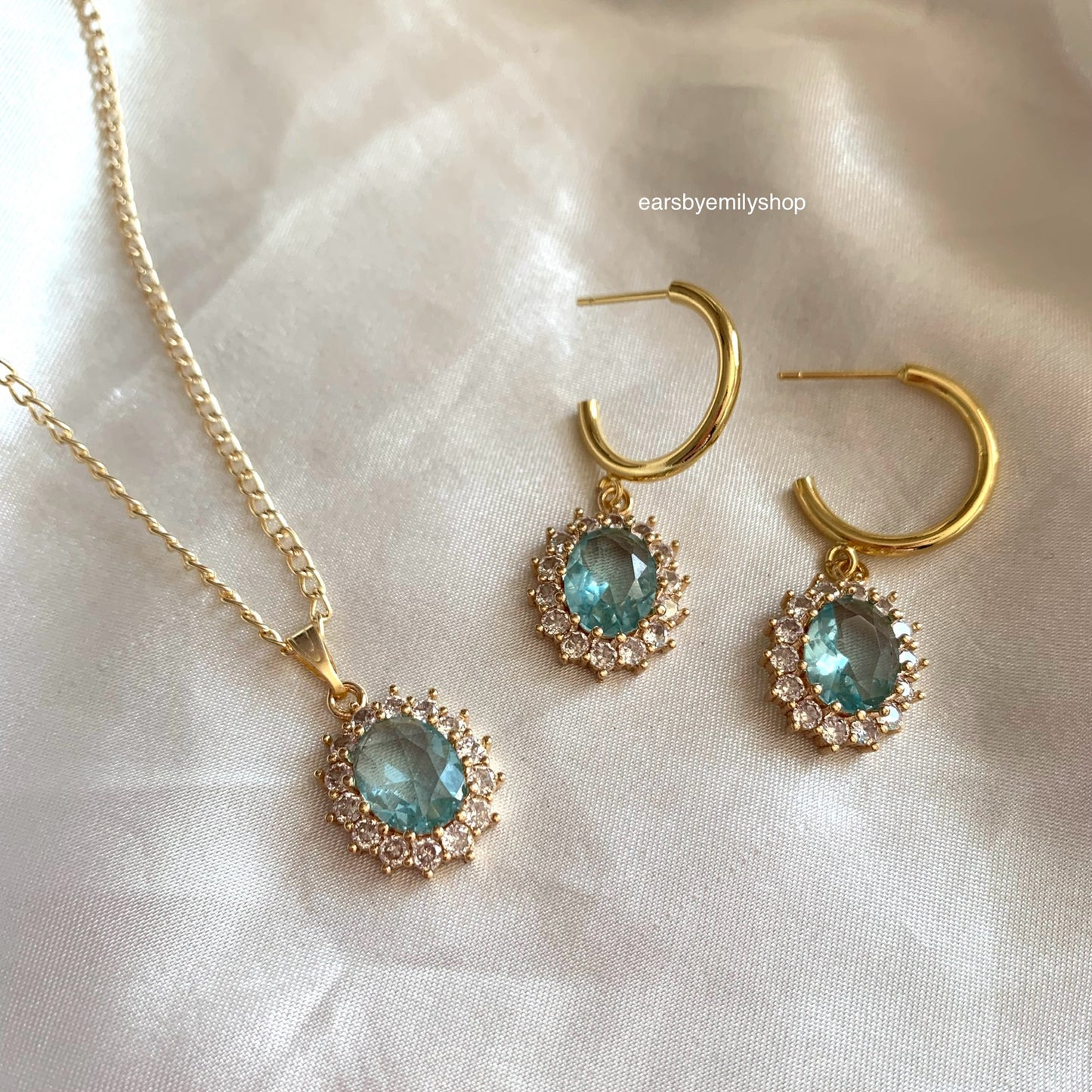 Gold plated light blue oval crystal with diamanté necklace, earrings or jewellery set