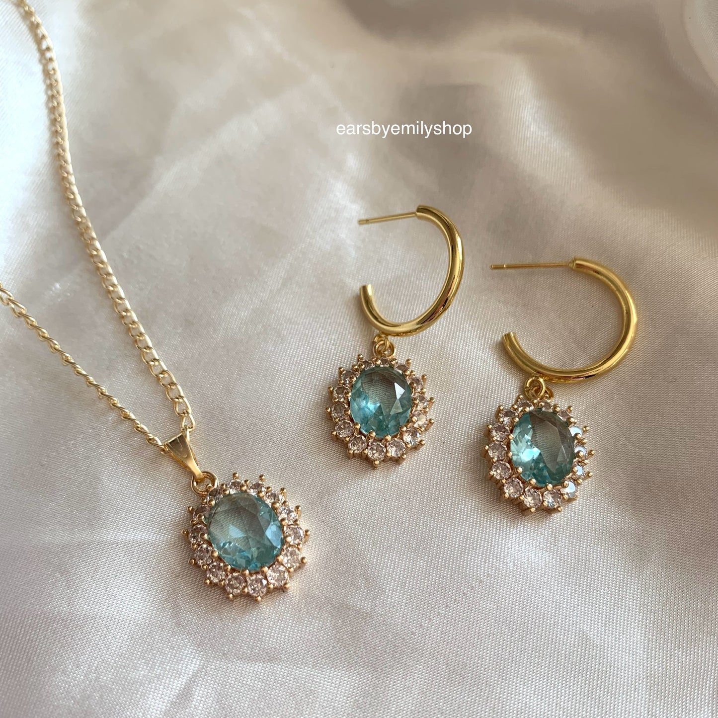 Gold plated light blue oval crystal with diamanté necklace, earrings or jewellery set