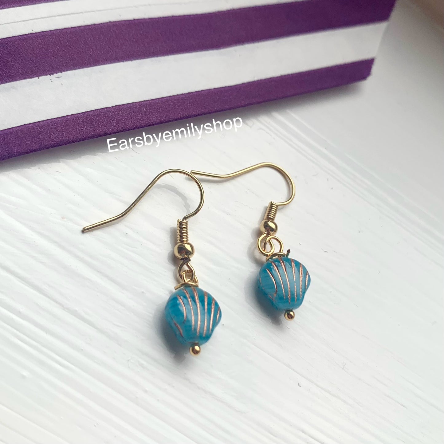 Cool quirky beach inspired blue clam shell earrings on 18k gold plated hooks
