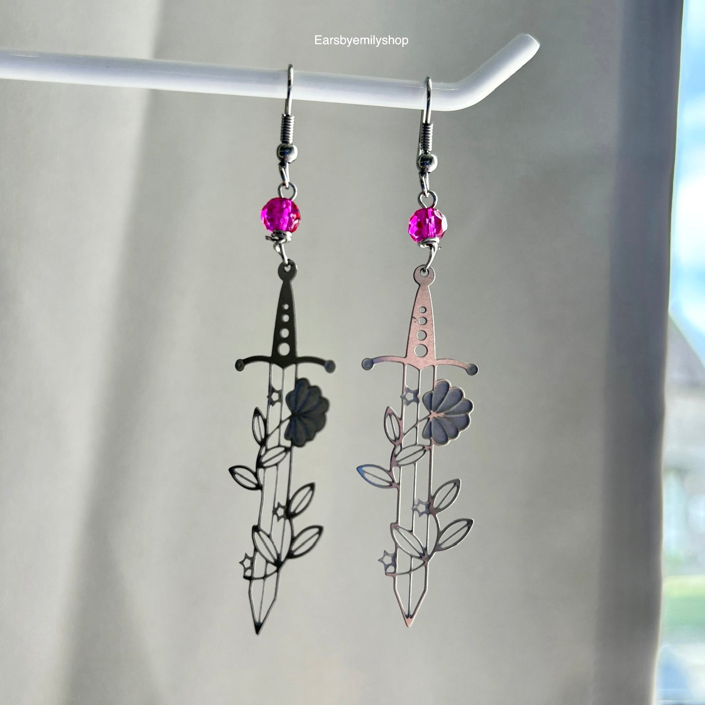 Silver stainless steel floral sword earrings with pink or green beads