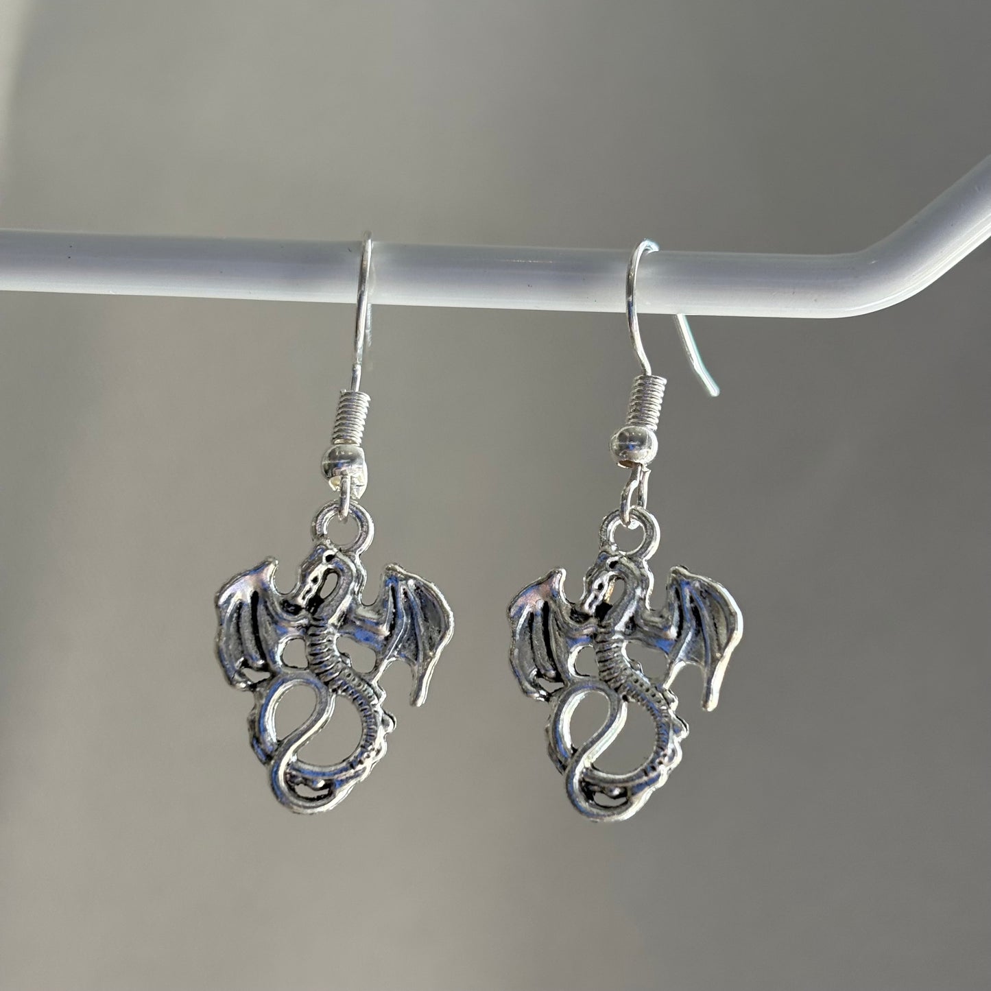 Silver little dragon dangle earrings