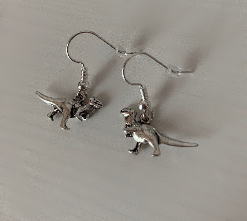 Silver plated trex dinosaur Dino earrings