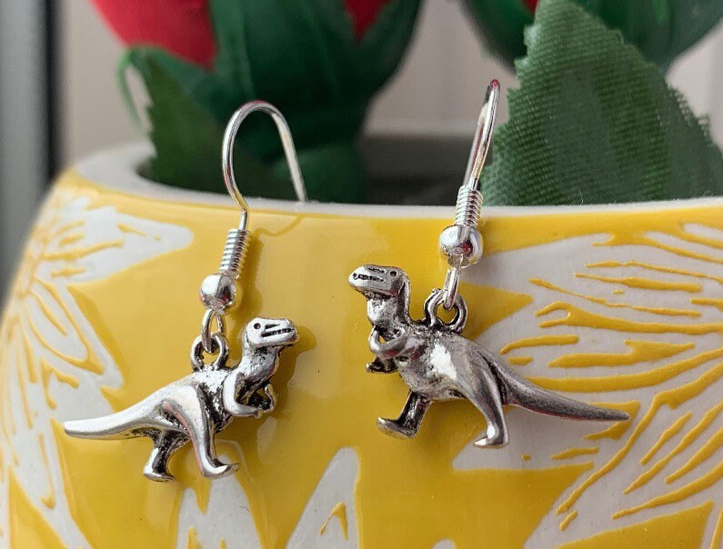 Silver plated trex dinosaur Dino earrings