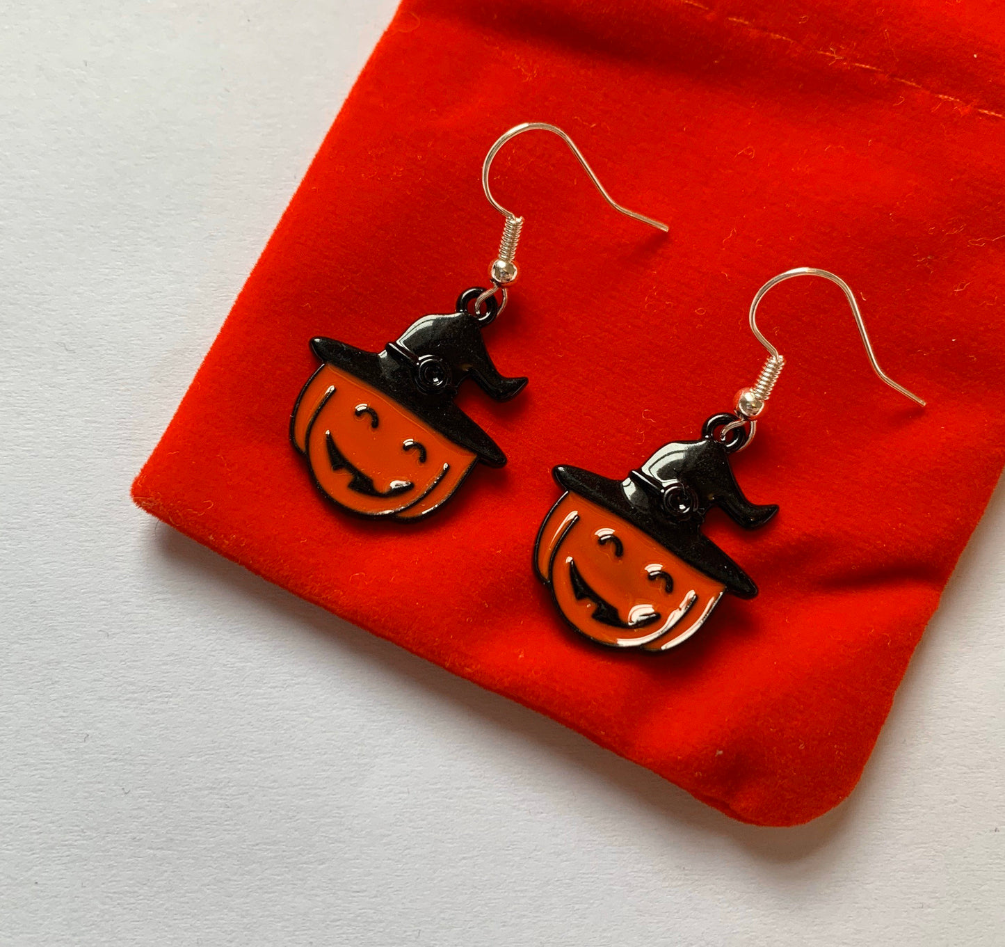 Orange and black pumpkin with witch hat earrings