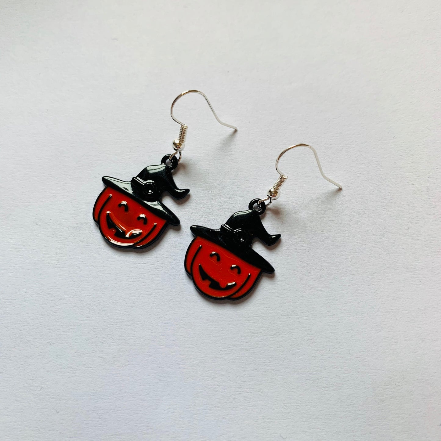 Orange and black pumpkin with witch hat earrings