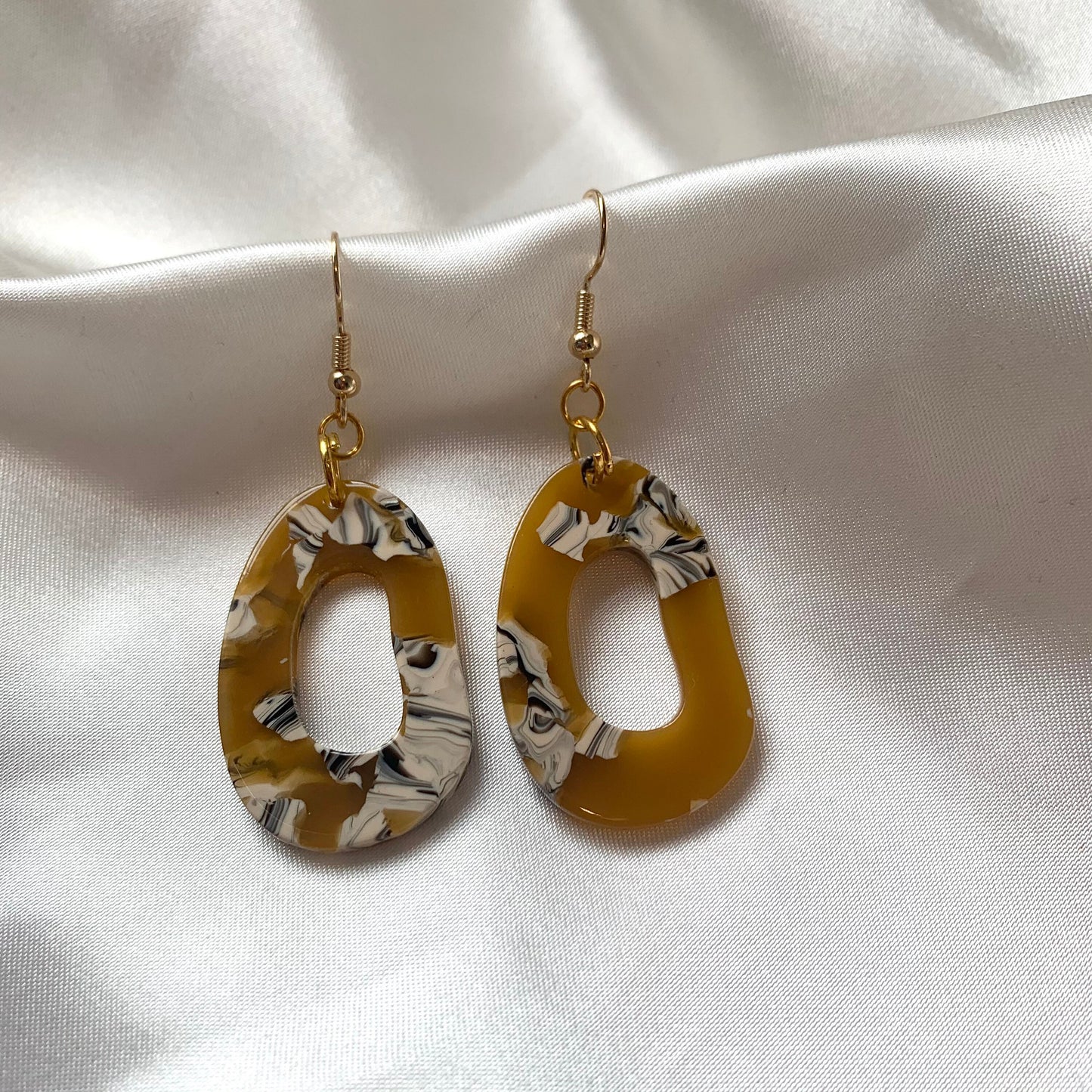 Caramel brown oval abstract gold dangle earrings