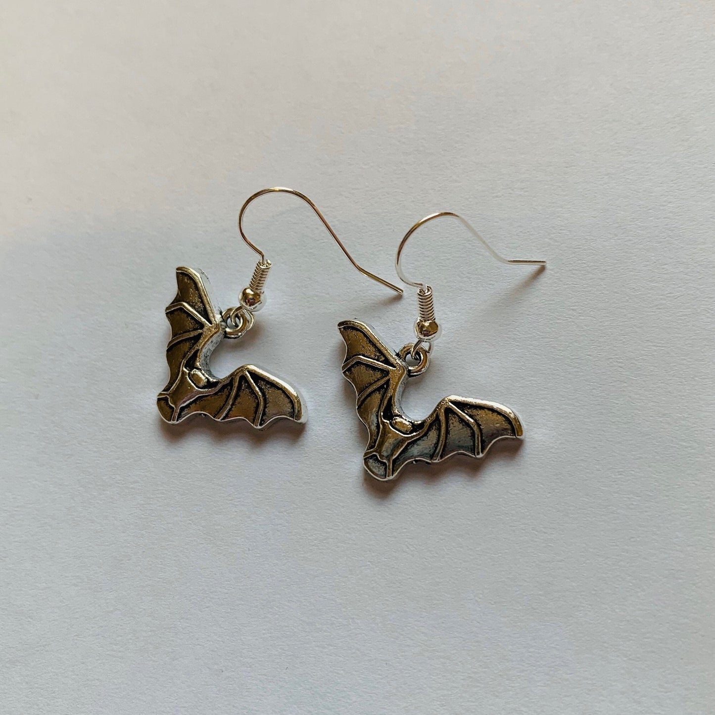 Silver bat halloween earrings