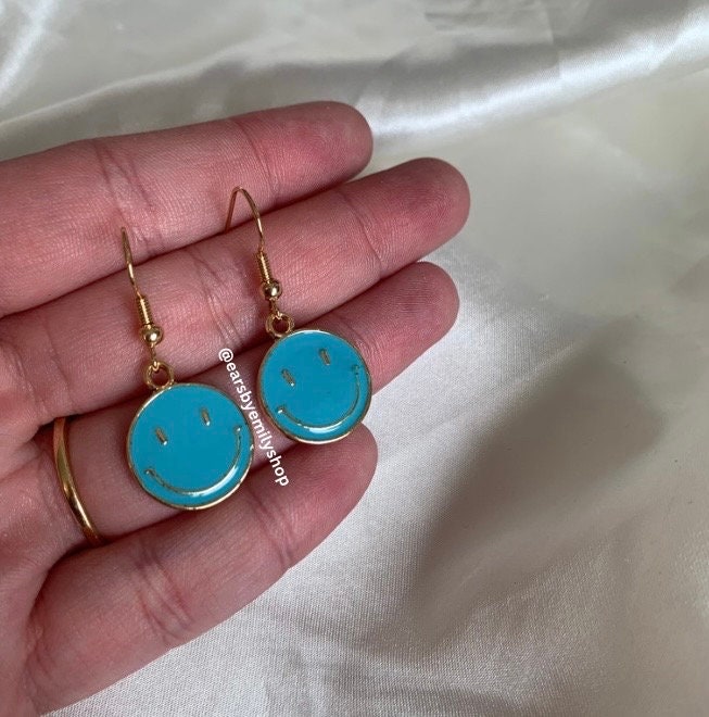 Blue smiley face dangle gold earrings