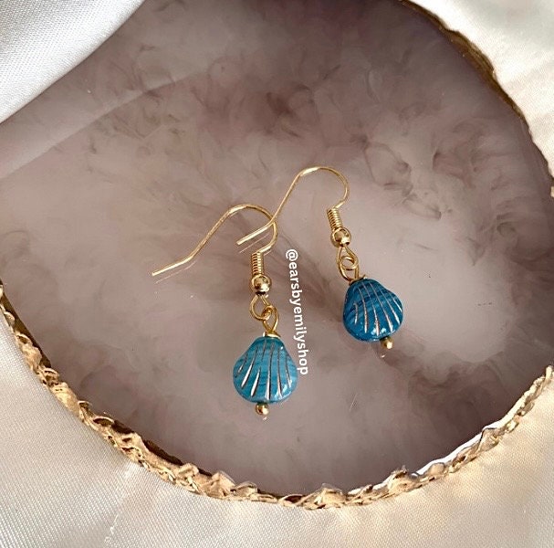 Cool quirky beach inspired blue clam shell earrings on 18k gold plated hooks
