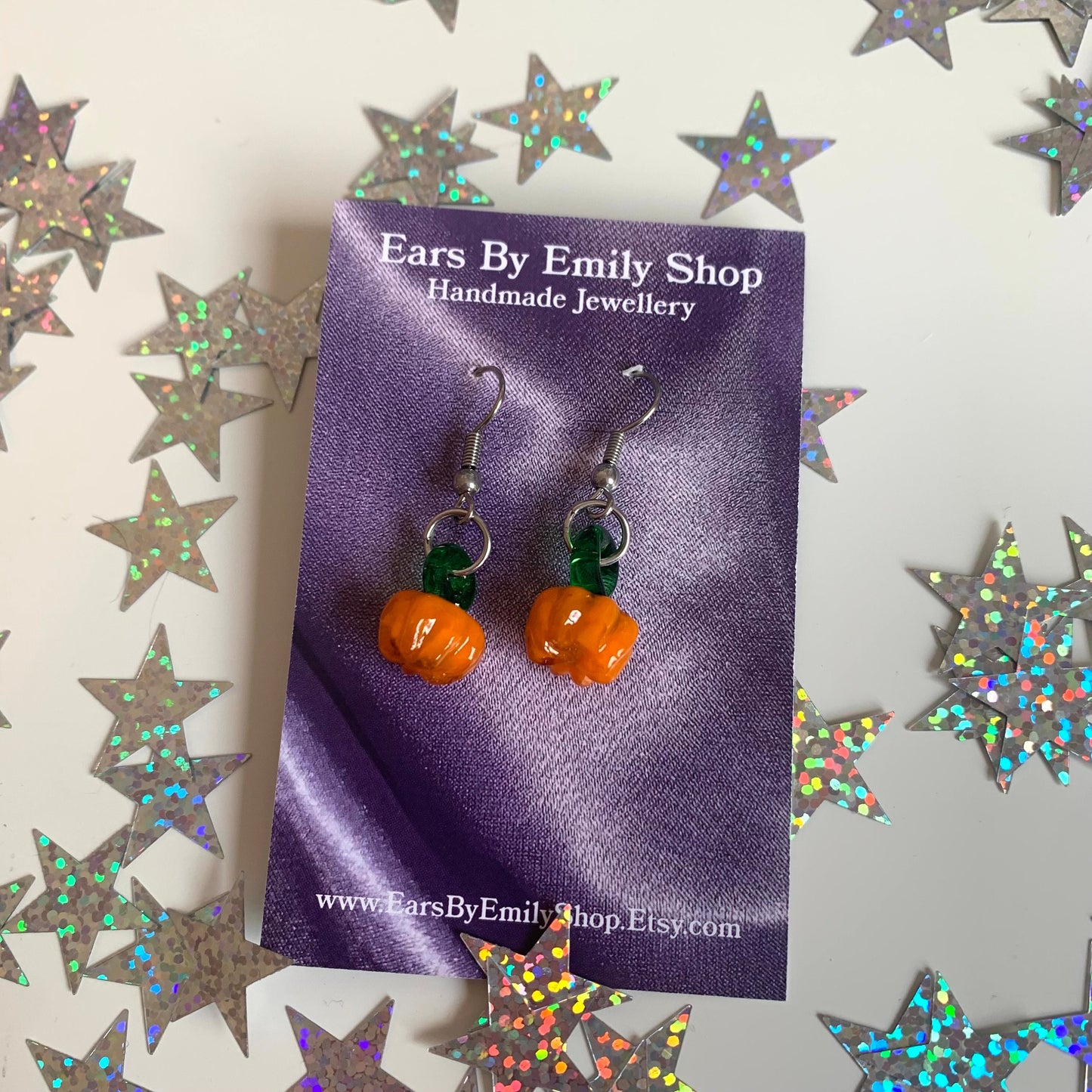 Orange glass lampwork pumpkin dangle Halloween surgical steel earrings