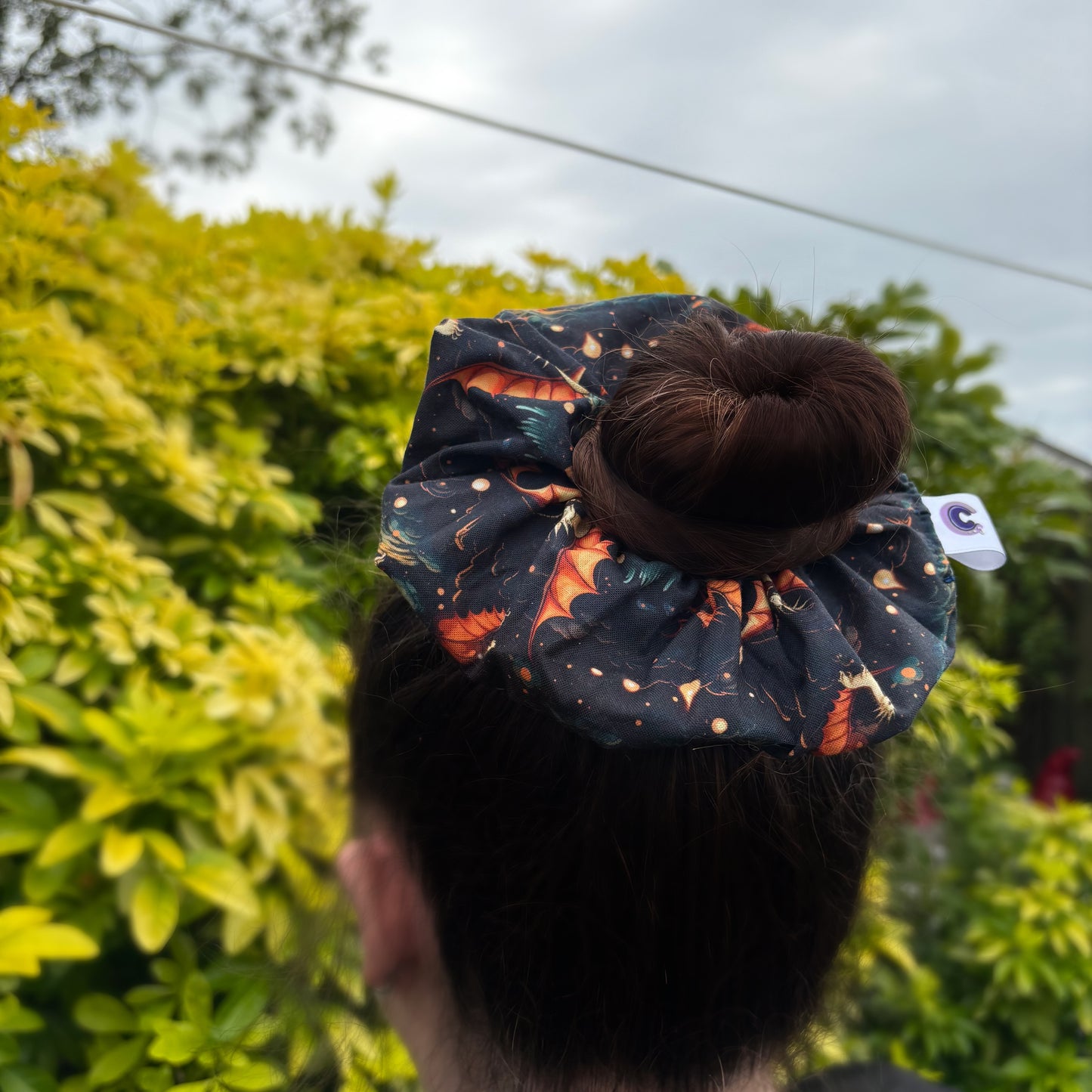 Big handmade fantasy book inspired dragon navy and orange scrunchie