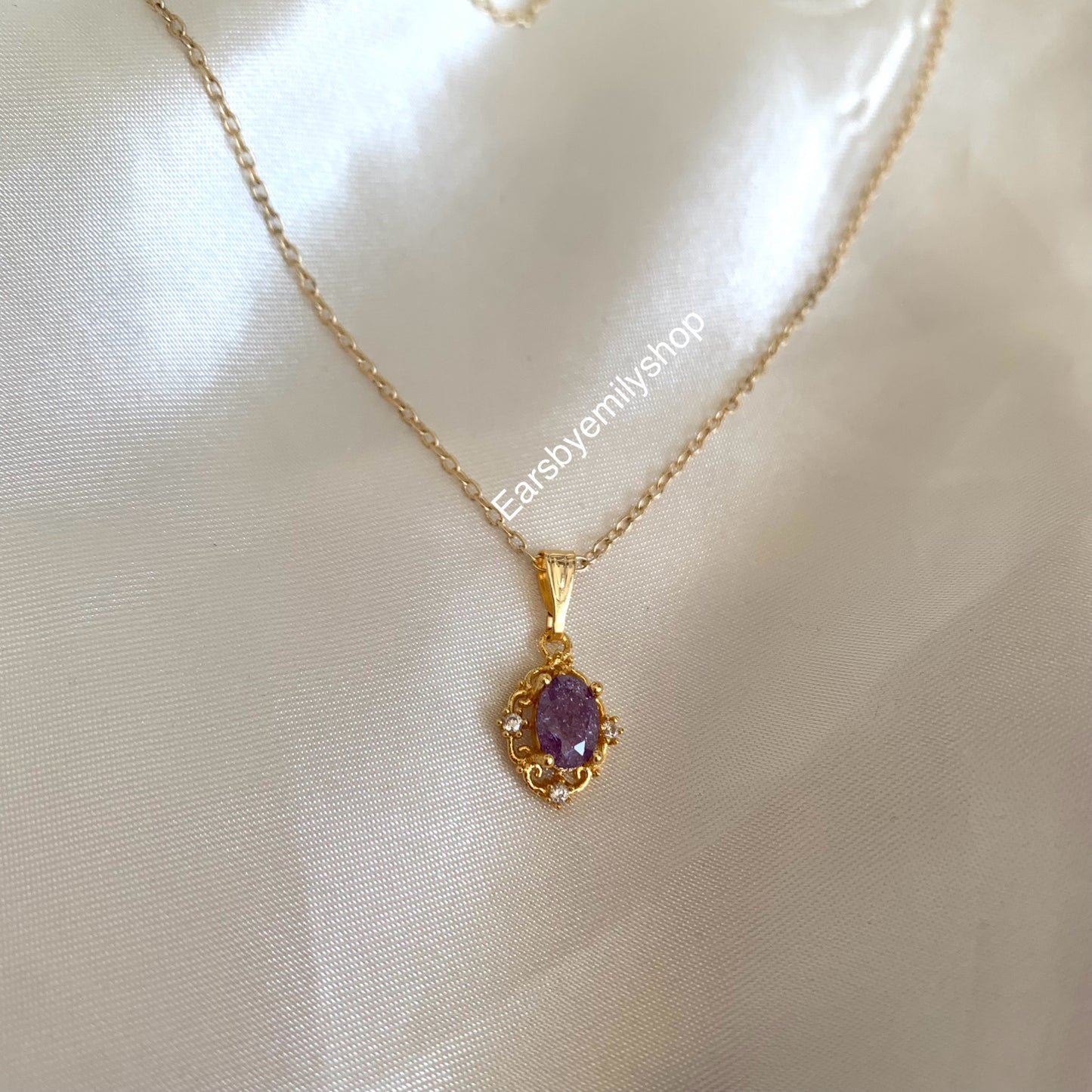 Gold plated purple crystal necklace