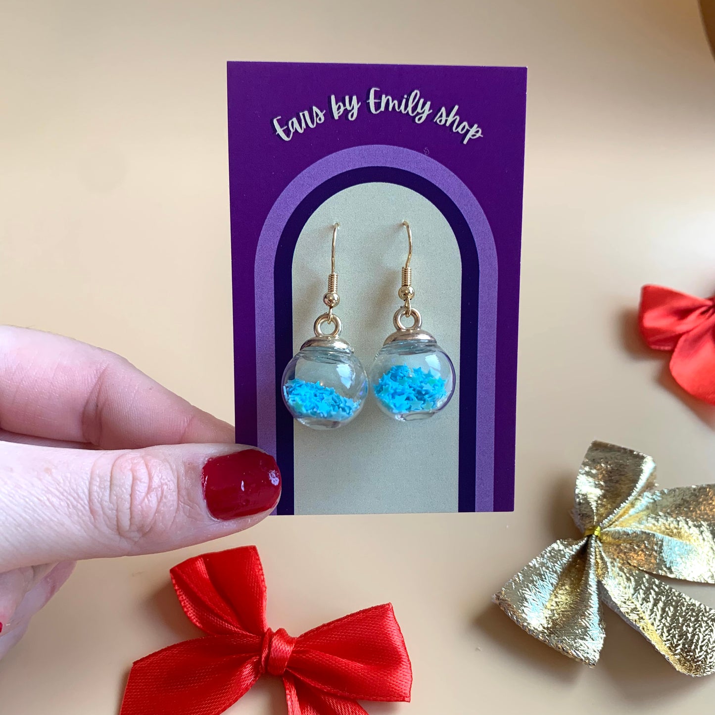 Festive blue Christmas bauble gold earrings