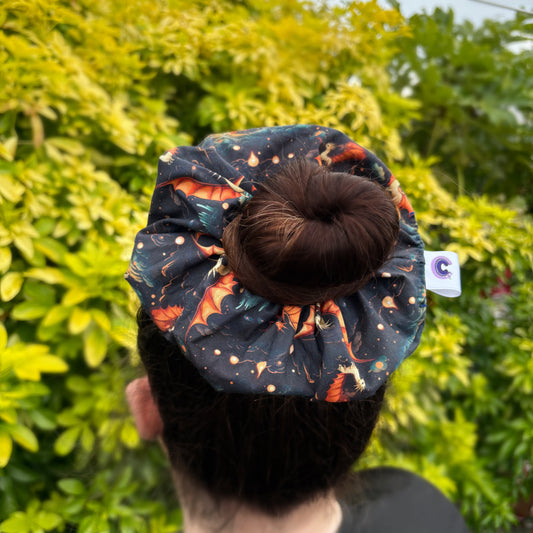 Big handmade fantasy book inspired dragon navy and orange scrunchie