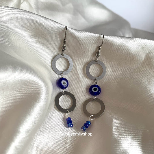 Stainless steel circle and blue evil eye bead statement dangle earrings