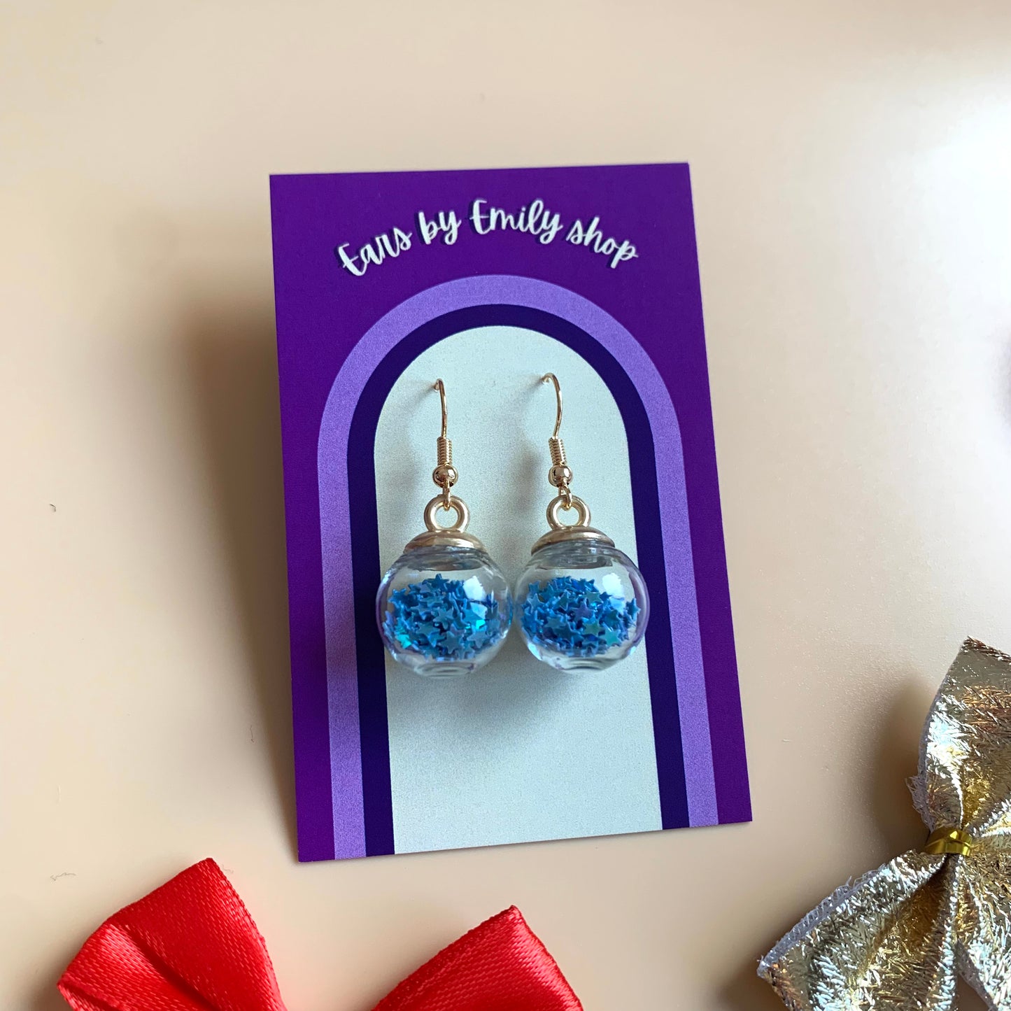 Festive blue Christmas bauble gold earrings