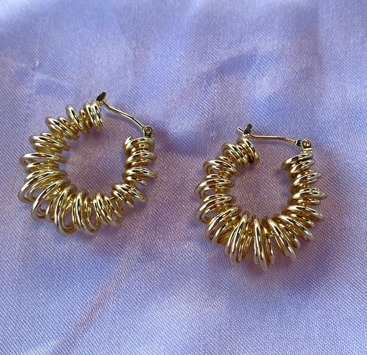 Gold plated squiggle statement hoop earrings