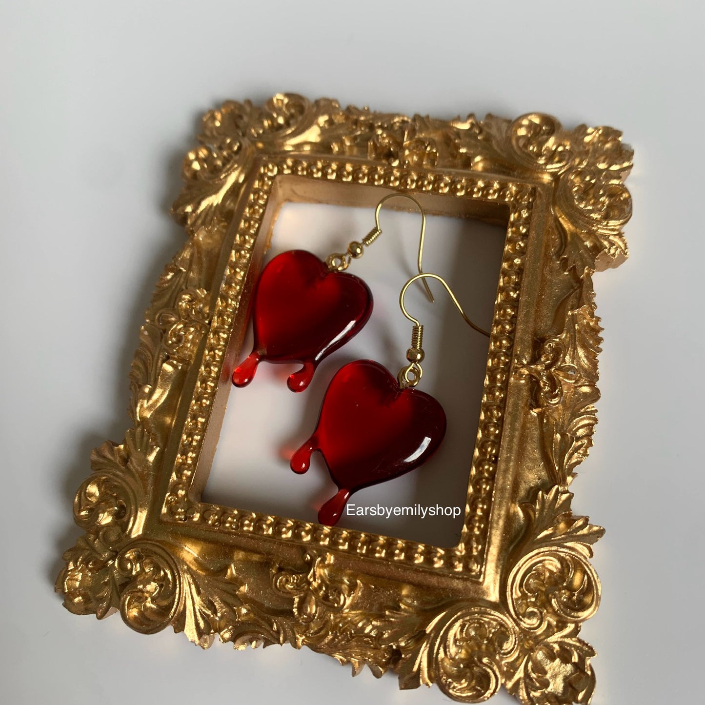 Dark red dripping heart gold earrings