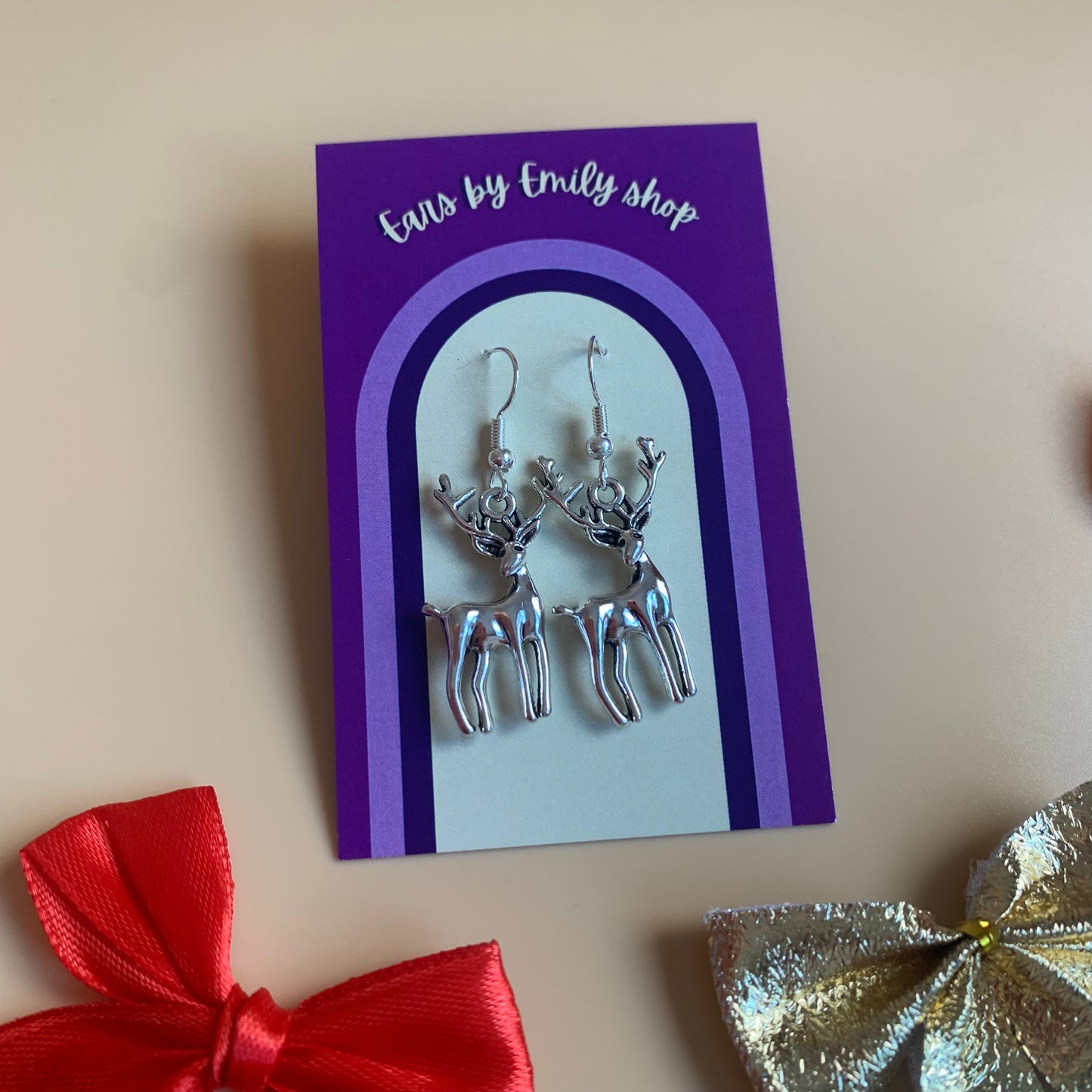 Festive silver reindeer Christmas earrings