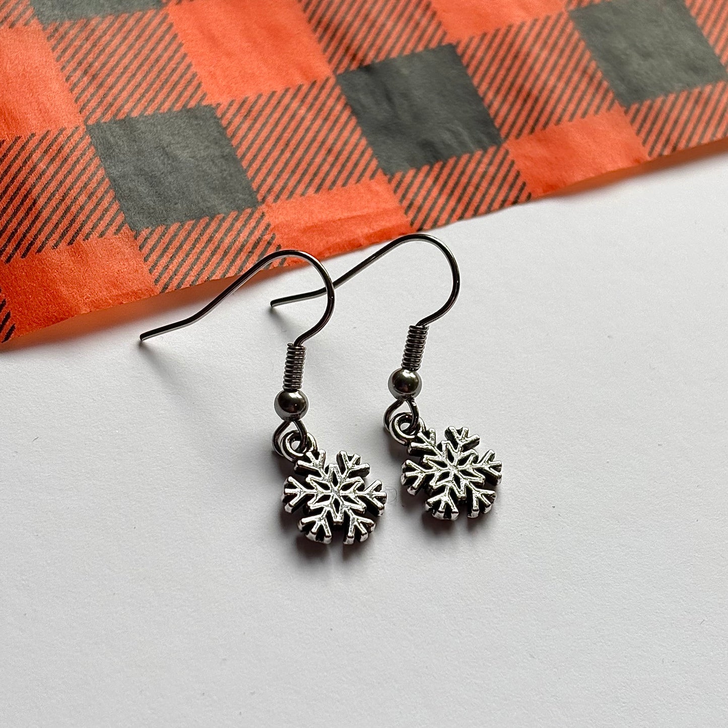 Silver minimalist Christmas snowflake dangle earrings