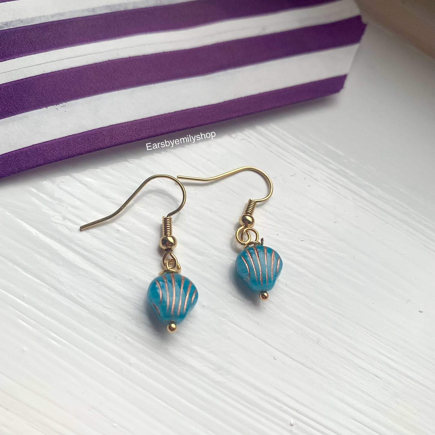 Cool quirky  beach inspired blue clam shell earrings on 18k gold plated hooks