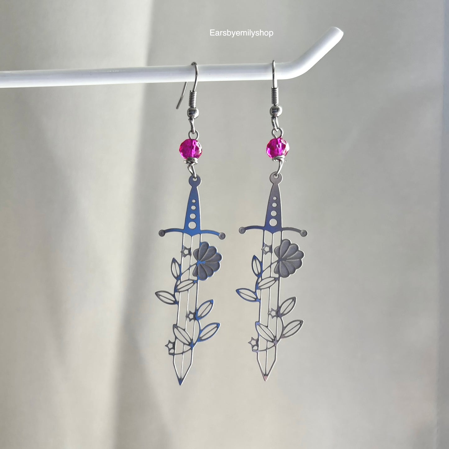 Silver stainless steel floral sword earrings with pink or green beads