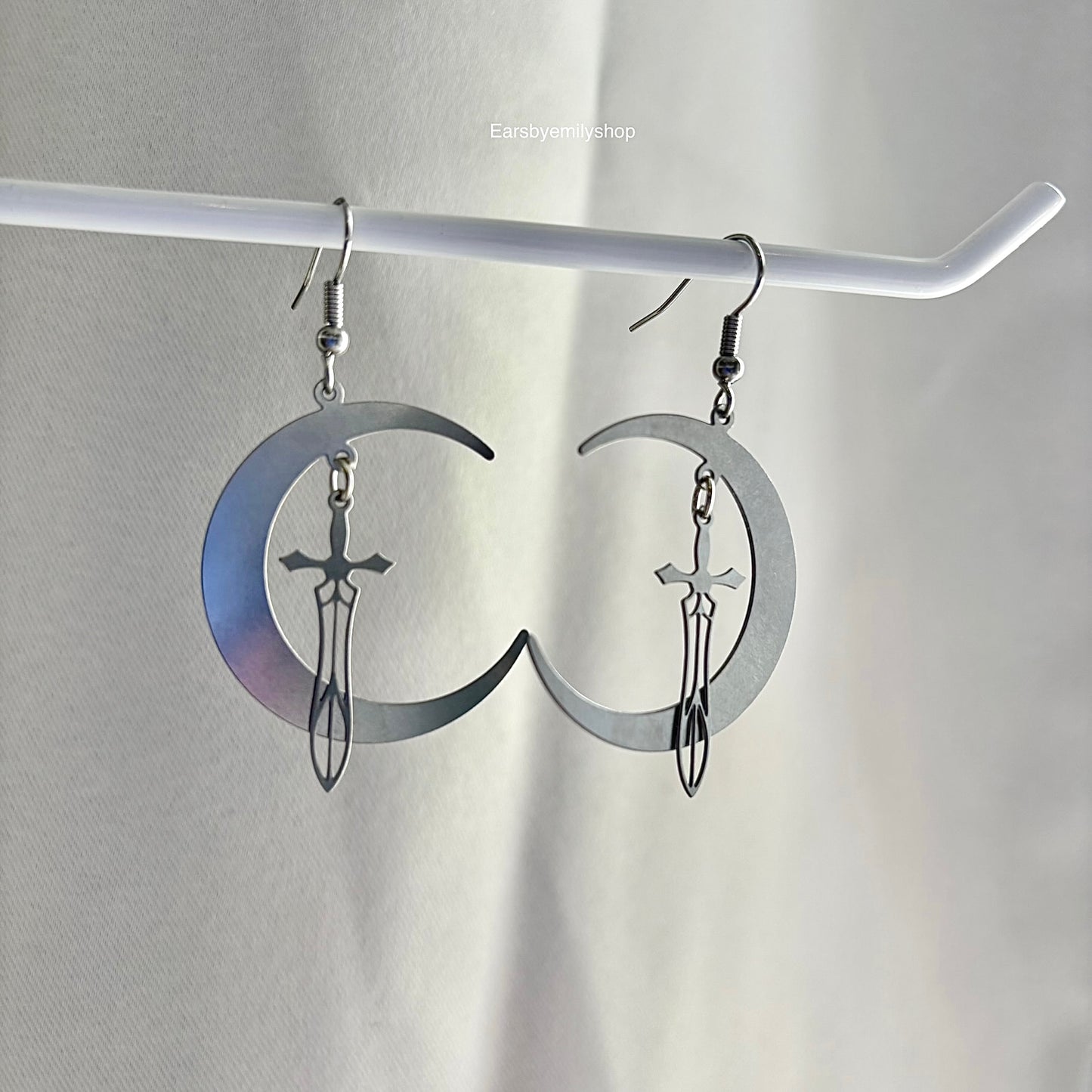 Large cool stainless steel moon with swords silver earrings