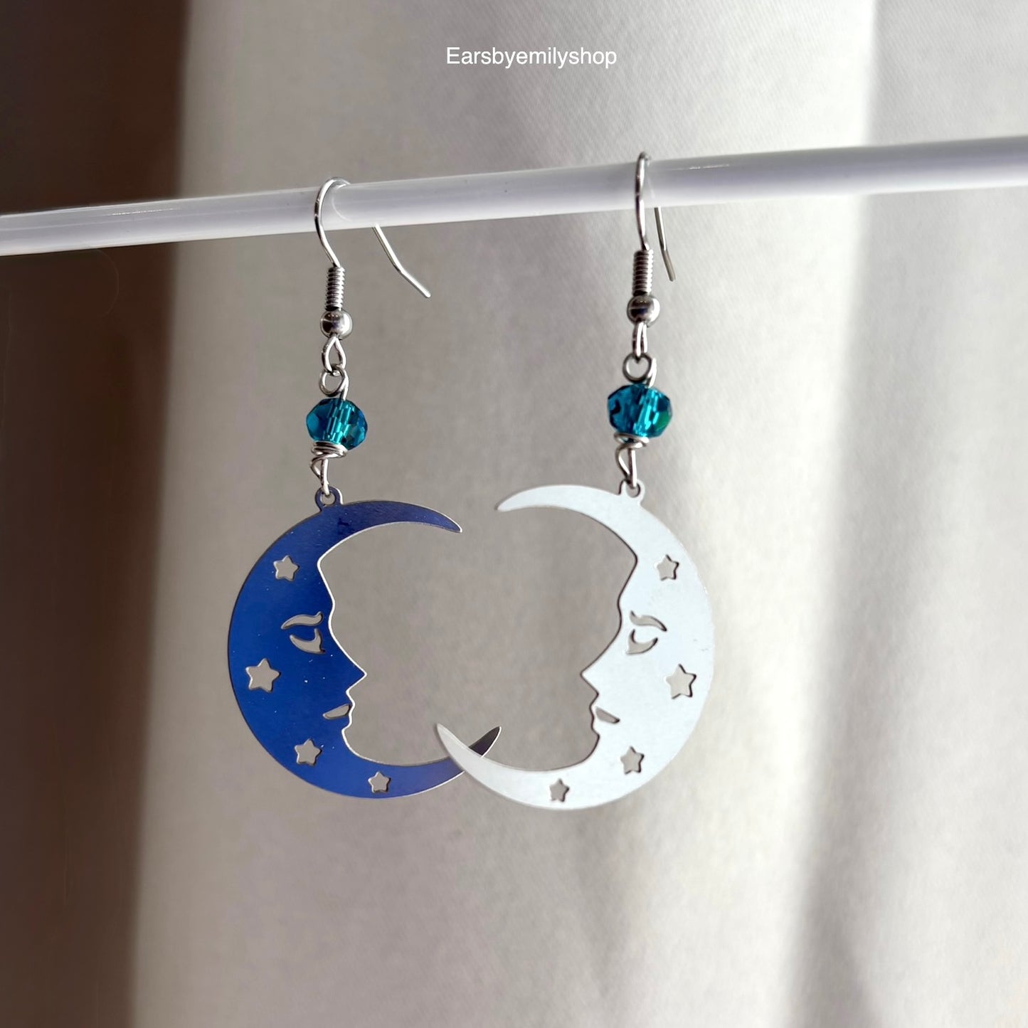 Stainless steel silver statement moon face earrings with blue beads