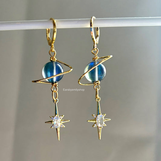 Gold plated celestial Saturn planet dangle hoop earrings with diamanté star