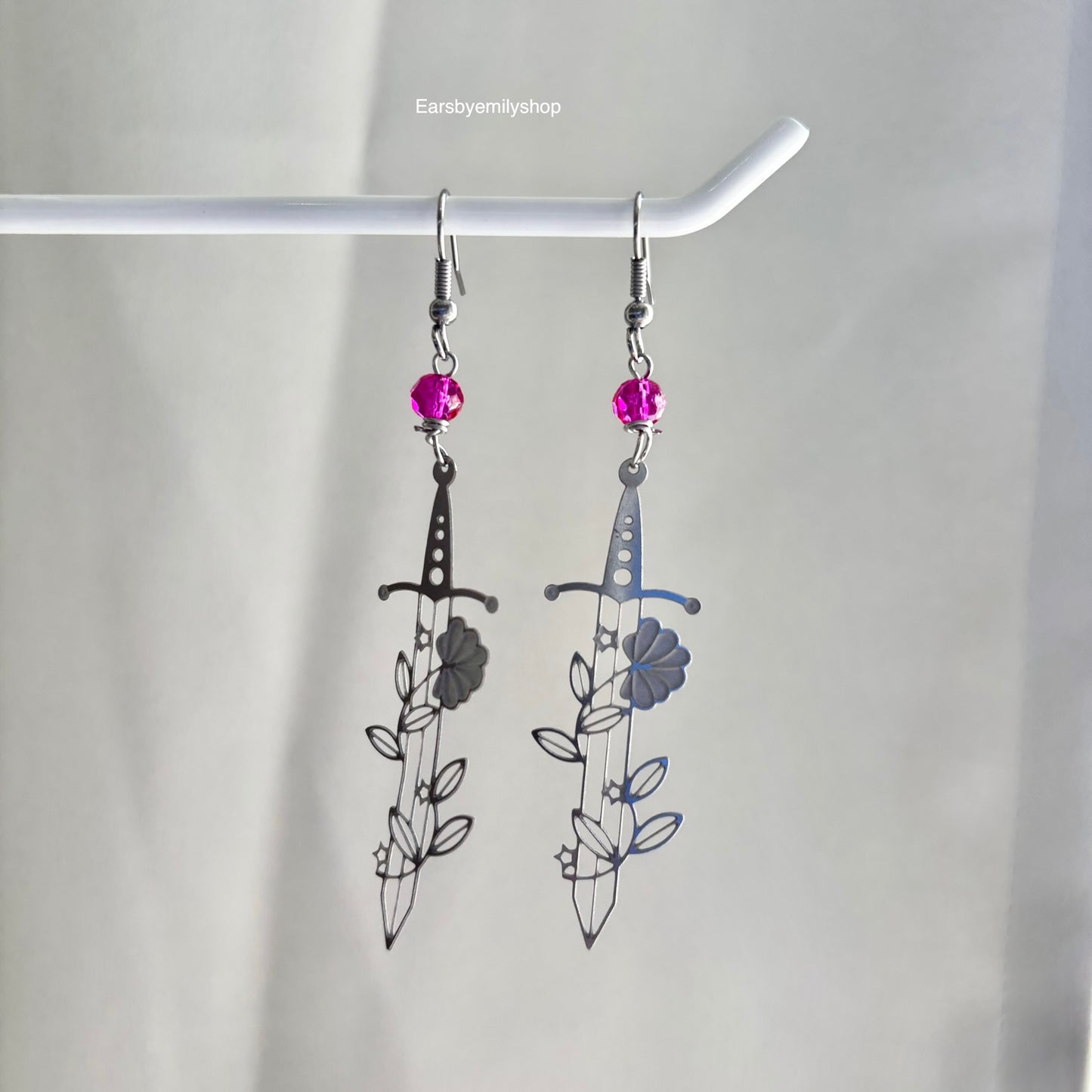 Silver stainless steel floral sword earrings with pink or green beads
