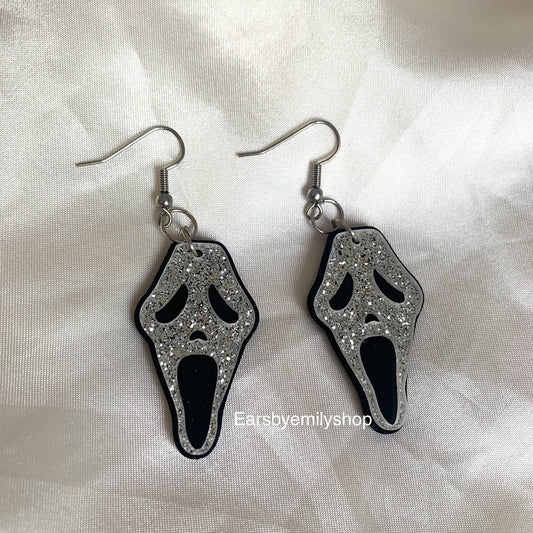 Black and glitter silver Halloween face earrings