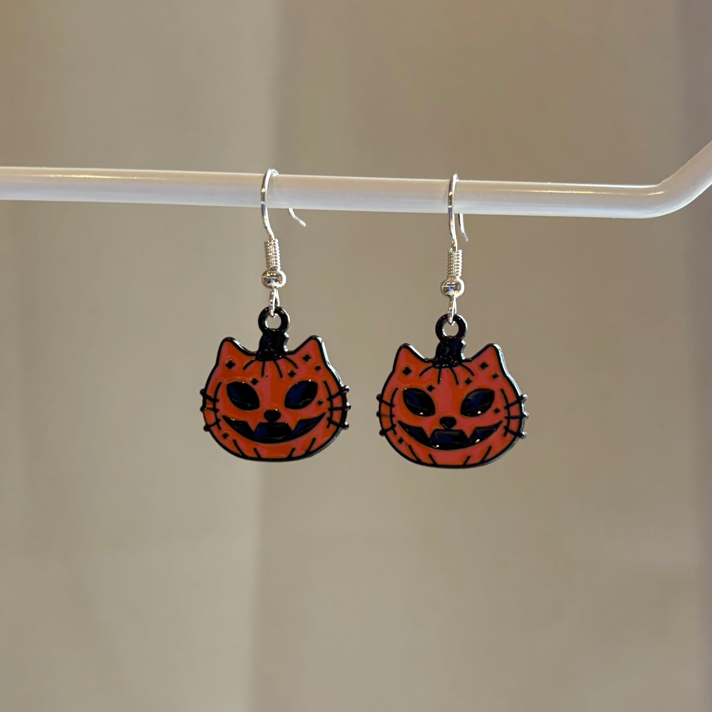 Cool orange pumpkin cat Halloween earrings on hypoallergenic surgical steel hooks