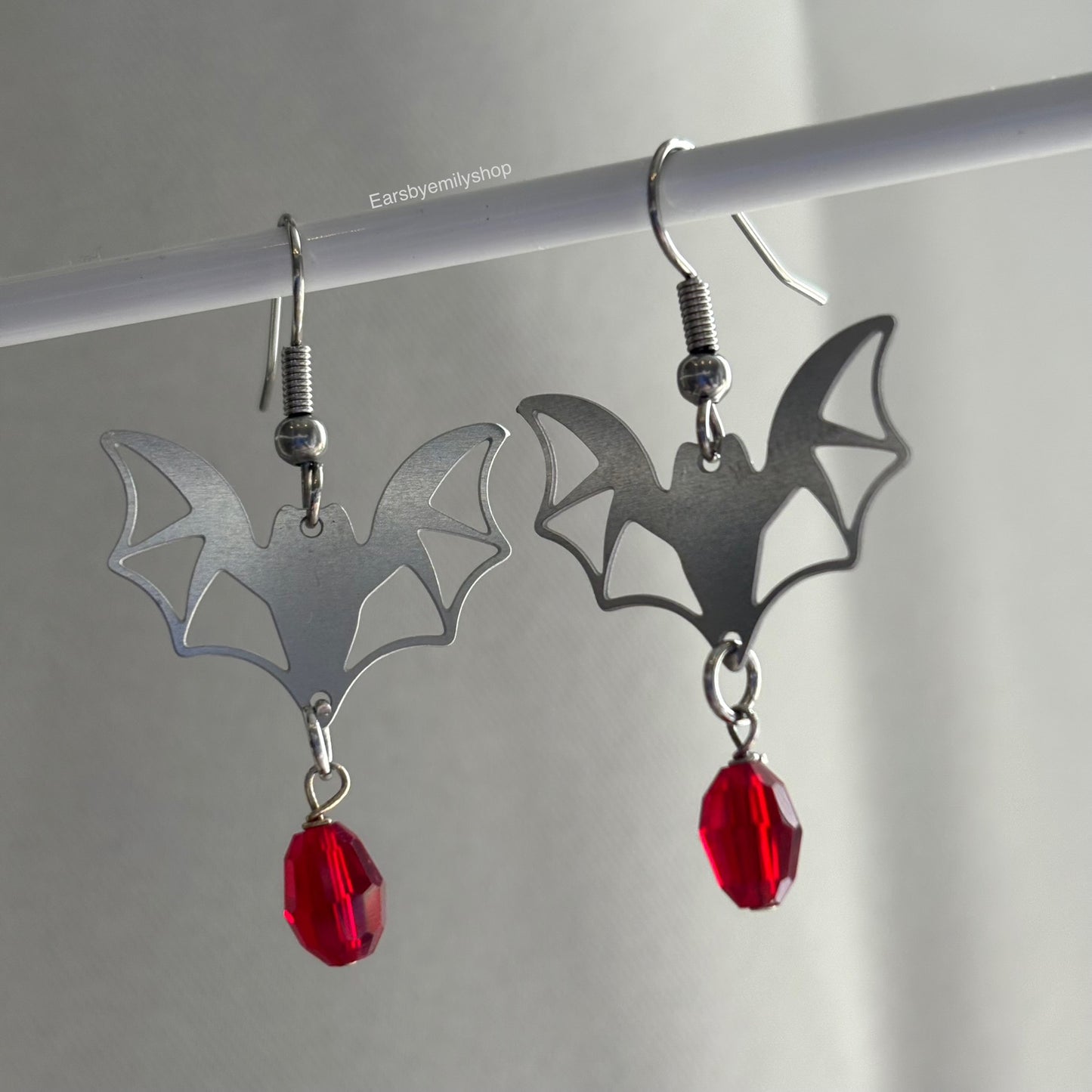 Stainless steel bat with red bead hypoallergenic earrings