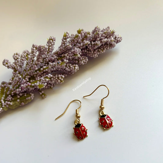 Cool red and black tiny ladybird insect dangle earrings on 18k gold plated hooks
