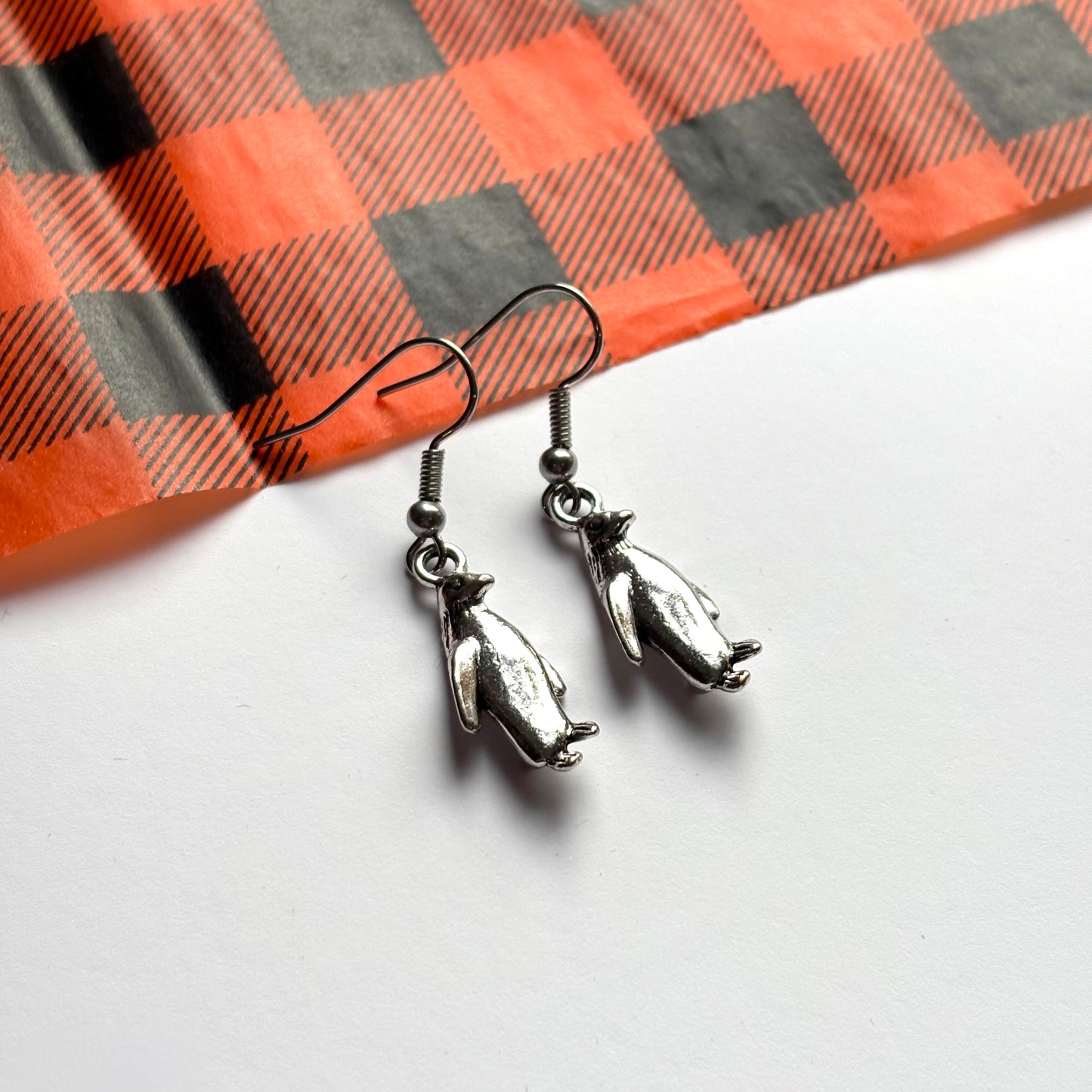 Silver dangle Christmas penguin earrings