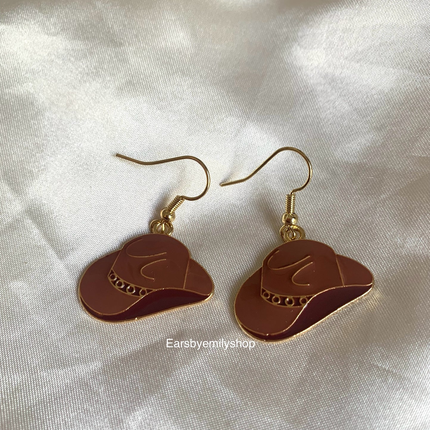 Brown cowboy boot and hat dangle gold earrings