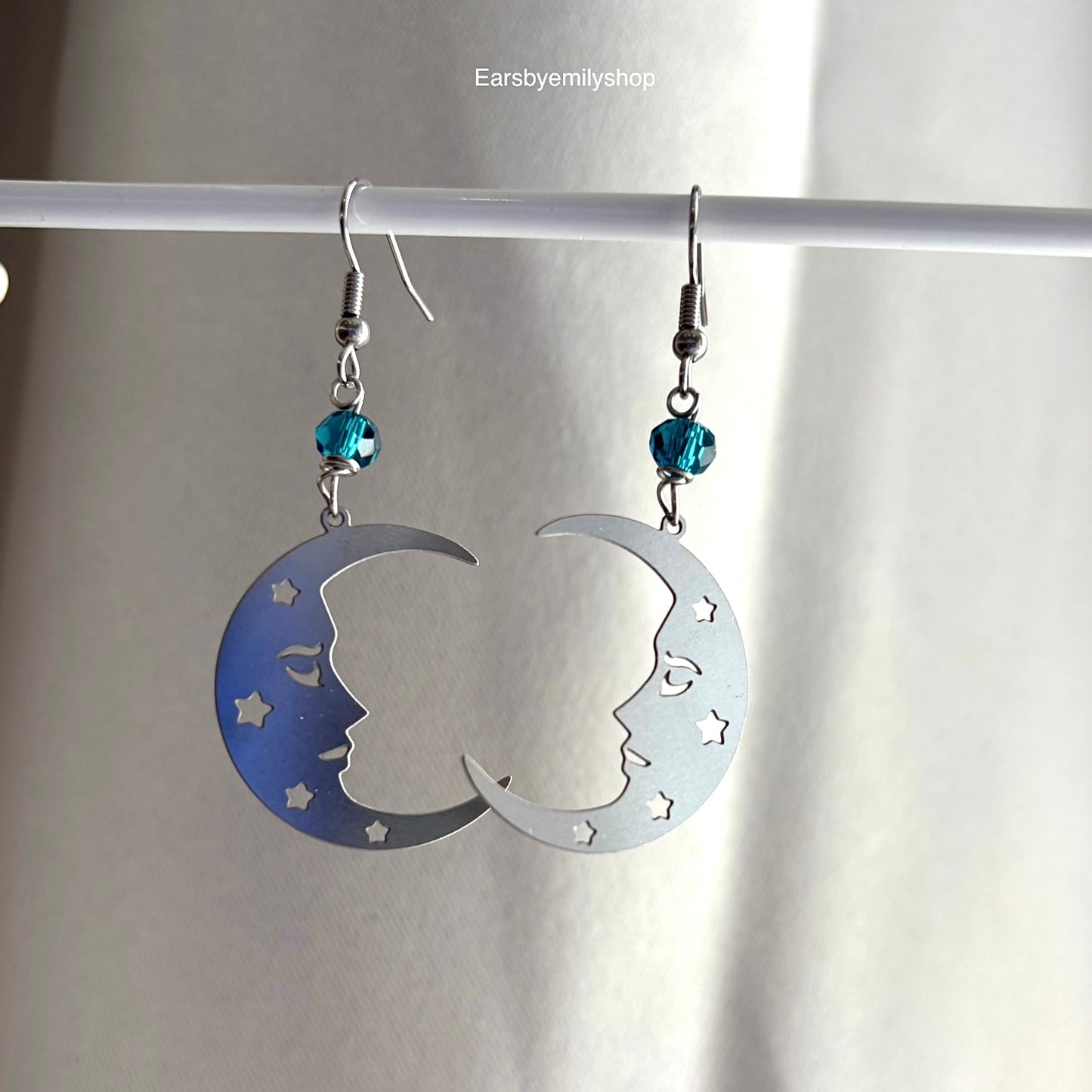 Stainless steel silver statement moon face earrings with blue beads